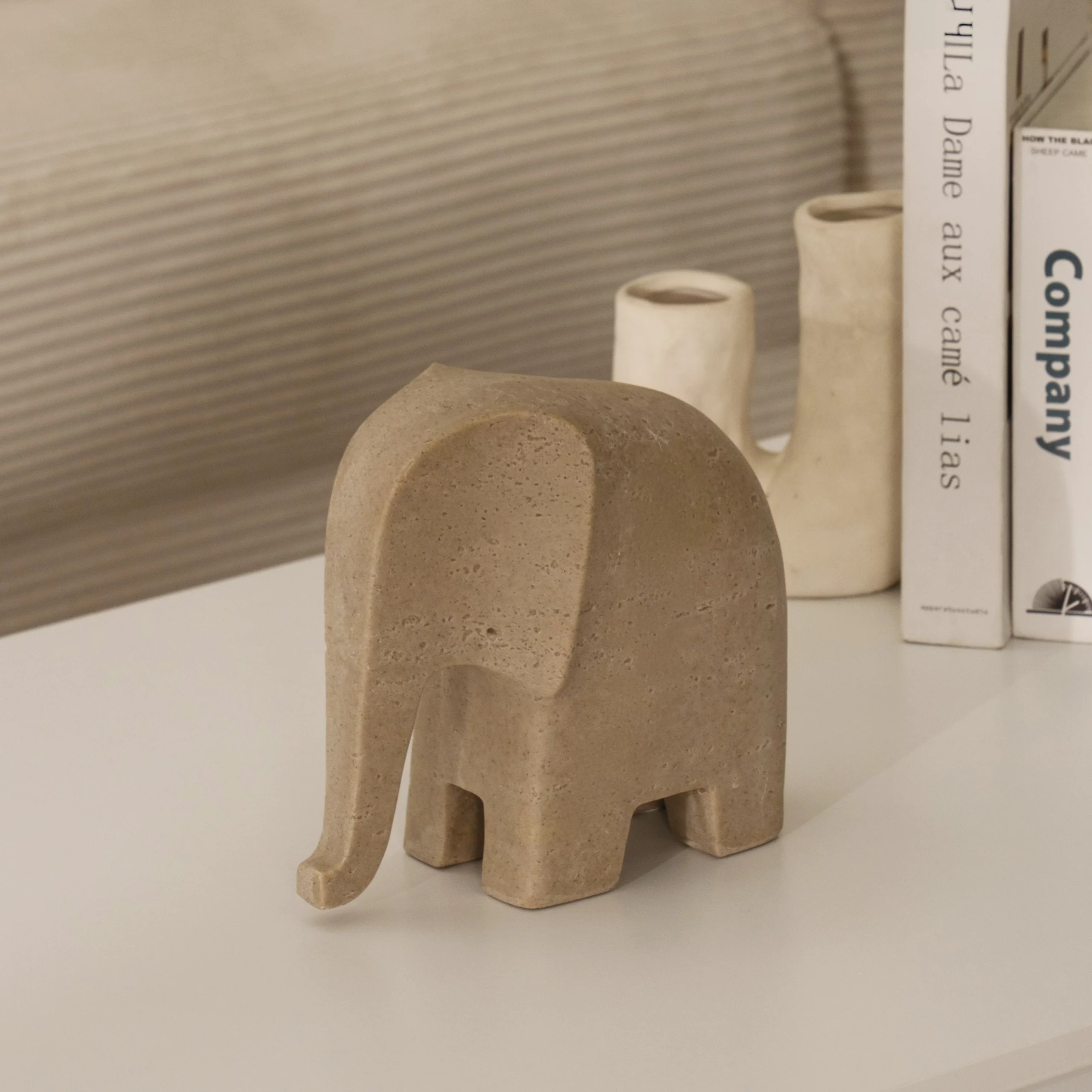 Rabaque travertine elephant accent 20x10x19.5cm