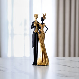 Rayn polyresin black and gold couple accent 12.5*7*35.5cm